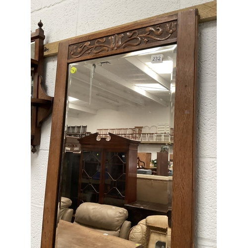 232 - OAK FRAMED BEVEL EDGE WALL MIRROR 56