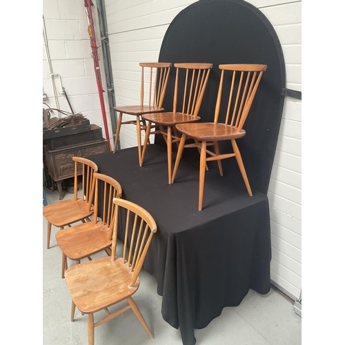 243 - 6 BLONDE ERCOL STRETCHERED DINING CHAIRS WITH SPINDLE BACK (1 NEEDS REPAIR)