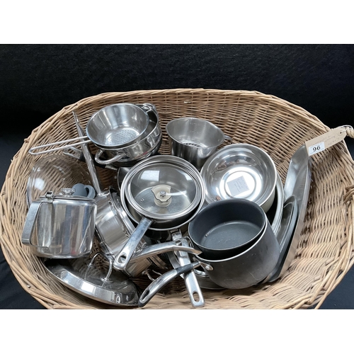 96 - LARGE BASKET OF KITCHENWARE TO INCLUDE SAUCEPANS, FRYING PAN, MEASURING JUG ETC