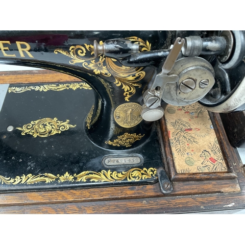 114 - OAK CASED SINGER HAND SEWING MACHINE