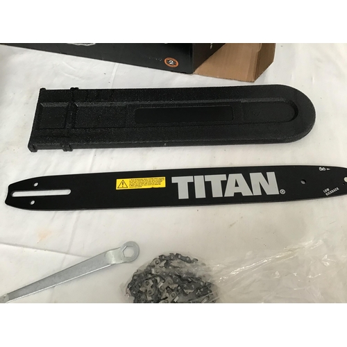 57 - TITAN 2000W ELECTRIC CHAINSAW IN BOX (NEEDS ASSEMBLY)