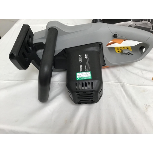 57 - TITAN 2000W ELECTRIC CHAINSAW IN BOX (NEEDS ASSEMBLY)