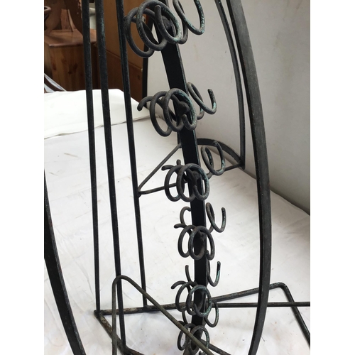 72 - CAST IRON WINE BOTTLE HOLDER H 34