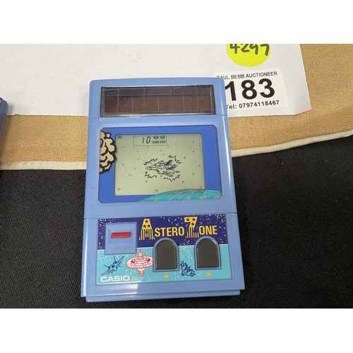 183 - 2 VINTAGE CASIO HAND HELD GAMES ASTROID CHICKEN AND ASTERO ZONE