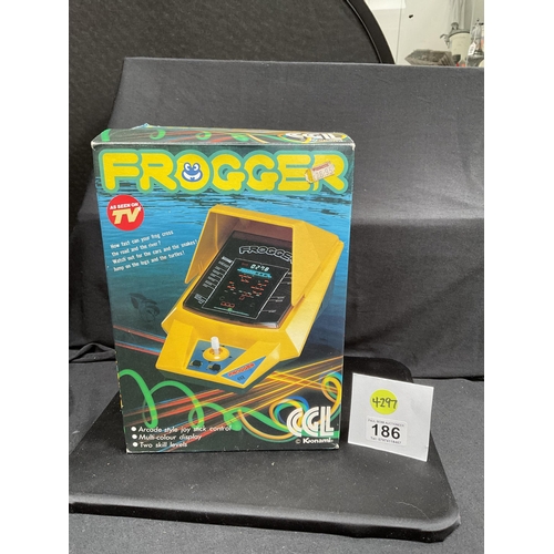 186 - VINTAGE KJONAMI FROGGER TABLE TOP ARCADE GAME IN ORIGINAL BOX AND ORIGINAL PACKAGING