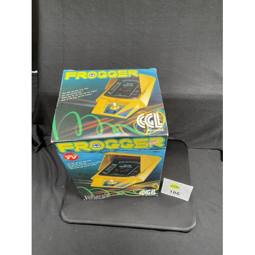 186 - VINTAGE KJONAMI FROGGER TABLE TOP ARCADE GAME IN ORIGINAL BOX AND ORIGINAL PACKAGING