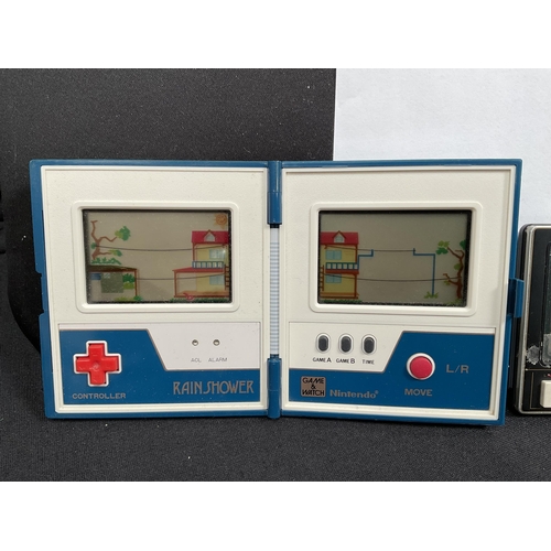 189 - VINTAGE NINTENDO MULTI SCREEN RAIN SHOWER HAND HELD GAME AND A CASIO TURBO DRIVE ELECTRONIC GAME