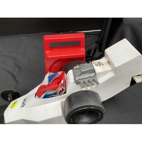 200 - EVIL KNIEVEL FORMULA 1 DRAGSTER WITH INSTRUCTIONS AND AN ENERGISER