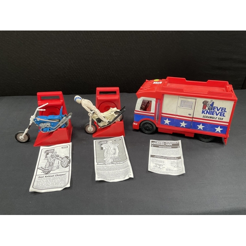 201 - EVIL KNIEVEL SCRAMBLE VAN AND CONTENTS WITH INSTRUCTIONS EVIL KNIEVEL STUNT CYCLE AND INSTRUCTIONS A... 