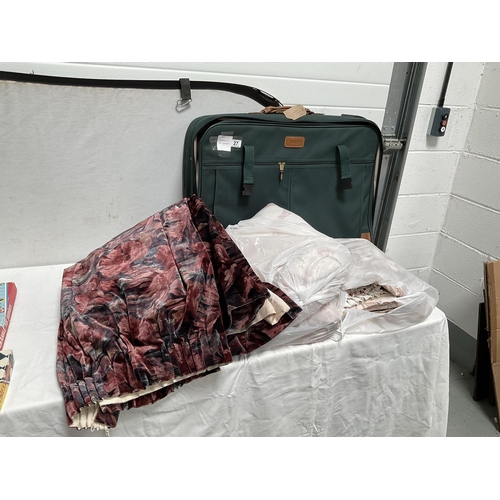 27 - LARGE SUITCASE OF CURTAINS