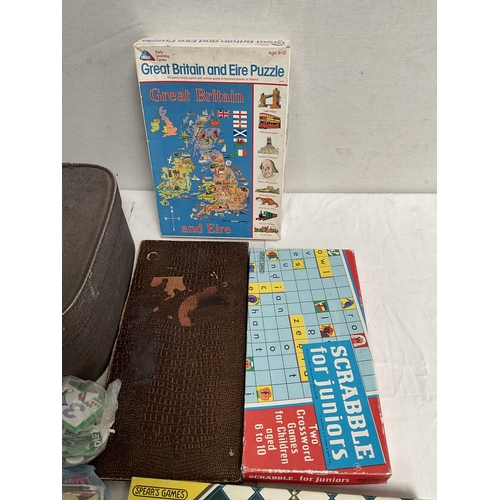 28 - VINTAGE SUITCASE INCLUDING VINTAGE GAMES ETC