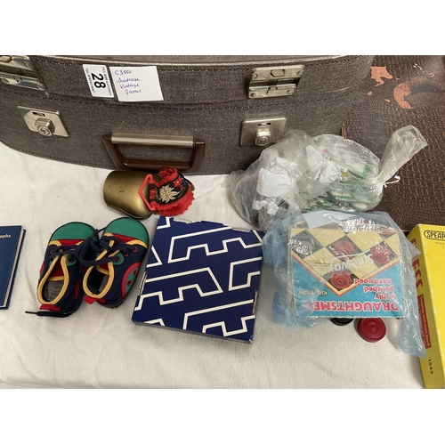 28 - VINTAGE SUITCASE INCLUDING VINTAGE GAMES ETC