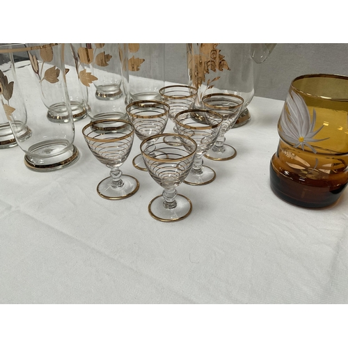 24 - 2 VINTAGE GLASS WATER SETS AND A SET OF 6 LIQUER GLASSES