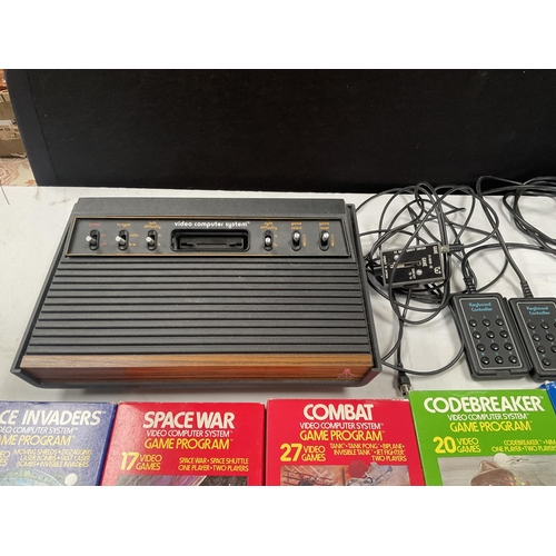 35 - ATARI VINTAGE VIDEO COMPUTER SYSTEM COMPLETE WITH GAMES