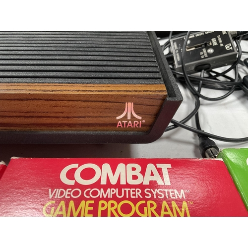 35 - ATARI VINTAGE VIDEO COMPUTER SYSTEM COMPLETE WITH GAMES