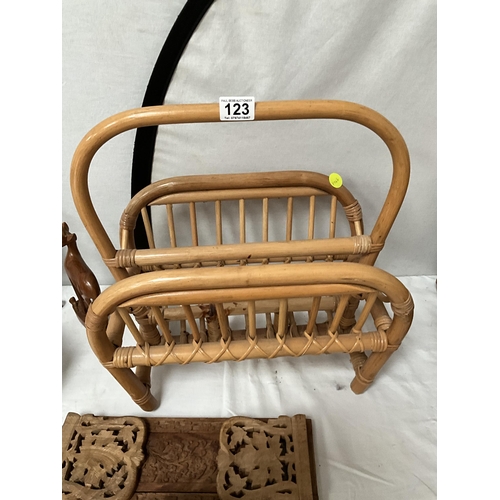 123 - PICNIC HAMPER CONTAINING WOODEN ITEMS AND A CANE MAGAZINE RACK