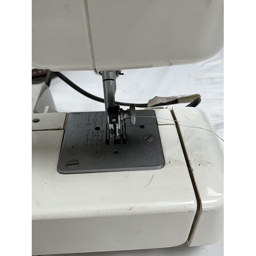 142 - JANOME NEWWORLD ELECTRIC SEWING MACHINE COMPELTE WITH COVER