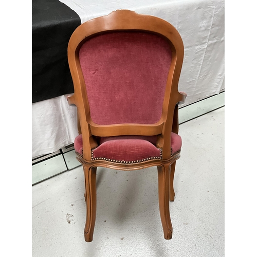 219 - REPRODUCTION BEDROOM ARMCHAIR WITH CARVED FRAME BUTTON BACK AND UPHOLSTERED SEAT