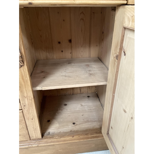 271 - VICTORIAN STRIPPED PINE KITCHEN PIECE WITH TOP CENTRE GLASS CABINET FLANKED BY 2 PANEL DOORS - THE B... 