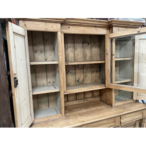 271 - VICTORIAN STRIPPED PINE KITCHEN PIECE WITH TOP CENTRE GLASS CABINET FLANKED BY 2 PANEL DOORS - THE B... 