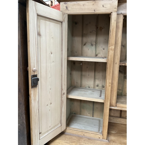 271 - VICTORIAN STRIPPED PINE KITCHEN PIECE WITH TOP CENTRE GLASS CABINET FLANKED BY 2 PANEL DOORS - THE B... 