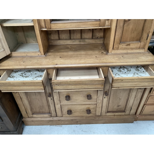 271 - VICTORIAN STRIPPED PINE KITCHEN PIECE WITH TOP CENTRE GLASS CABINET FLANKED BY 2 PANEL DOORS - THE B... 