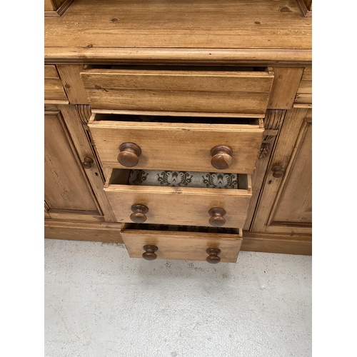 271 - VICTORIAN STRIPPED PINE KITCHEN PIECE WITH TOP CENTRE GLASS CABINET FLANKED BY 2 PANEL DOORS - THE B... 