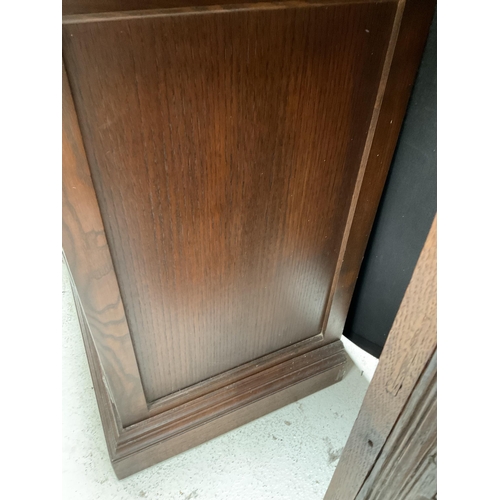 281 - LARGE OAK REPRODUCTION SIDEBOARD WITH 3 DRAWERS TO TOP AND 4 DOORS BELOW BADGED YOUNGER H30