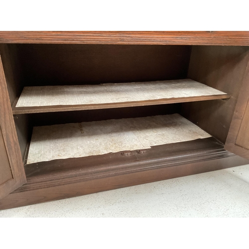 281 - LARGE OAK REPRODUCTION SIDEBOARD WITH 3 DRAWERS TO TOP AND 4 DOORS BELOW BADGED YOUNGER H30