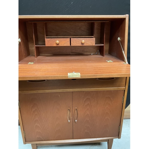 288 - RETRO TEAK BUREAU WITH FITTED TOP CENTRAL DRAWER OVER 2 DOORS H43