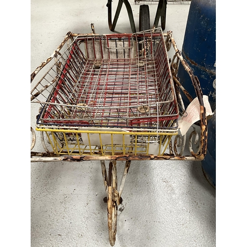 304 - VINTAGE WHEELBARROW, METAL RACK, ORNATE GARDEN BARROW PLANTER ETC