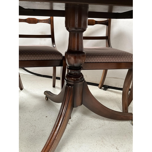 311 - REPRODUCTION MAHOGANY TWIN PEDESTAL DINING TABLE WITH 1 EXTRA LEAF AND 10 MATCHING DINING CHAIRS TO ... 