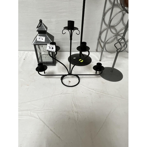 316 - METAL WINE RACK, 2 CANDLE STANDS LANTERN ETC