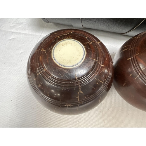 333 - 2 SETS OF CROWN GREEN BOWLS