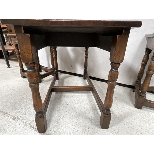 341 - REPRODUCTION SOLID OK NEST OF TABLES ON TURNED AND STRETCHERED LEGS WITH CARVED FREEZE DECORATION A/... 