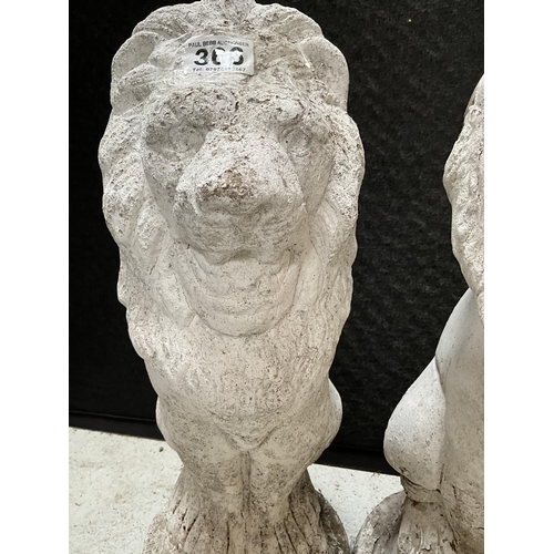 366 - PAIR OF GARDEN LION STATUES H21