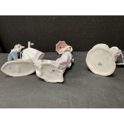 193 - LLADRO BOY & FIGURE WITH BALL FIGURE, LLADRO GIRL WITH FLOWERS FIGURE, LLADRO LADY WITH PARASOL FIGU... 