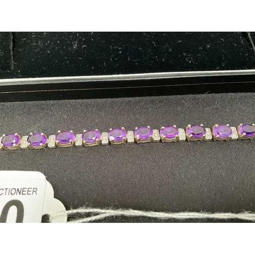 200 - LADIES 925 SILVER GILT AMETHYST BRACELET WITH DIAMOND SET SPACERS