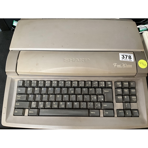 378 - SHARP ELECTRIC TYPEWRITER WITH INSTRUCTIONS AND CARTRIDGES AND A CLOCK RADIO