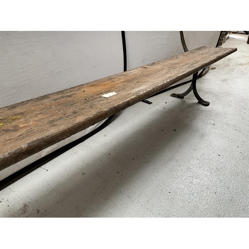 383A - WOODEN GARDEN BENCH ON 2 CAST LEGS H31 L96