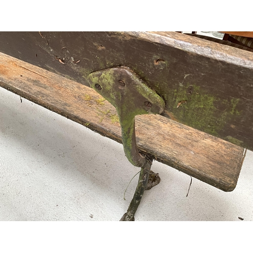 383A - WOODEN GARDEN BENCH ON 2 CAST LEGS H31 L96