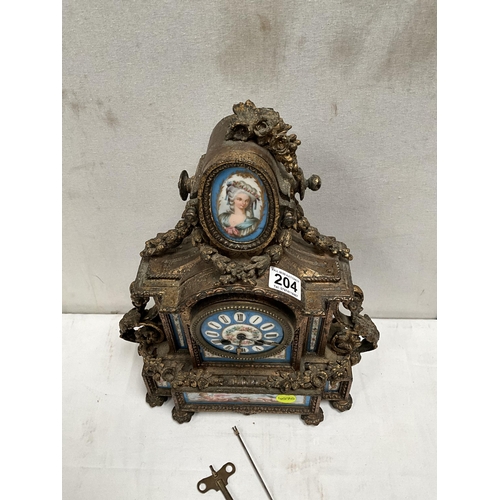 204 - FRENCH GILT METAL MANTEL CLOCK WITH PORCELAIN FACE AND PANELS DECORATED WITH BIRDS FOILAGE CHERUBS E... 