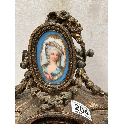 204 - FRENCH GILT METAL MANTEL CLOCK WITH PORCELAIN FACE AND PANELS DECORATED WITH BIRDS FOILAGE CHERUBS E... 