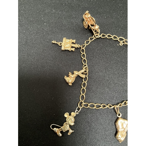 211 - 9CT GOLD CHARM BRACELET - TOTAL WEIGHT 16.5G