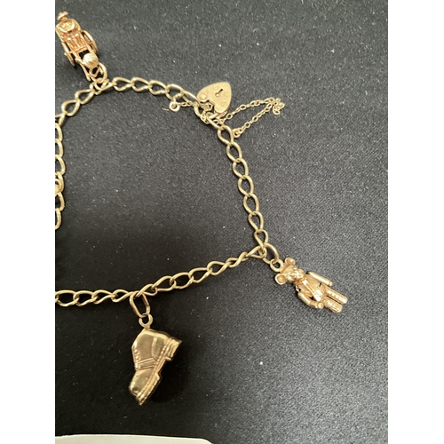 211 - 9CT GOLD CHARM BRACELET - TOTAL WEIGHT 16.5G