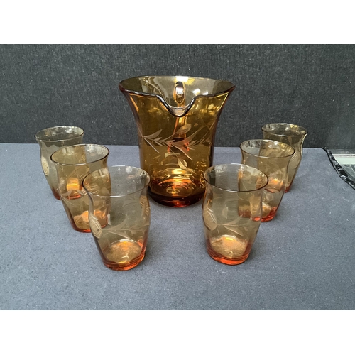 211 - VINTAGE ETCHED AMBER GLASS WATER SET - JUG AND 6 TUMBLERS