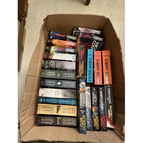 73 - 4 BOXES OF BOOKS INCLUDING DAN BROWN, CHRIS CARTER  AND QTY PHOTO FRAMES