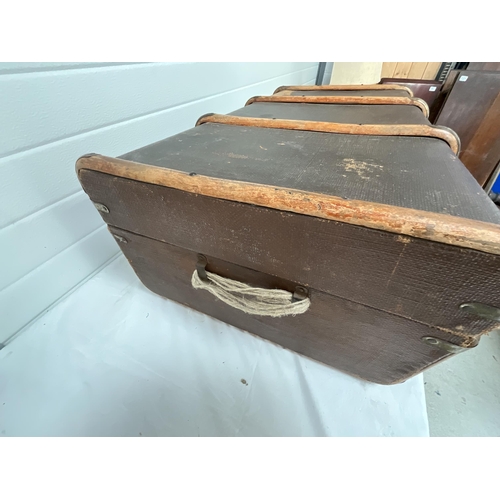 86 - LARGE BRASS BOUND TRAVEL TRUNK - HANDLE AT FAULT