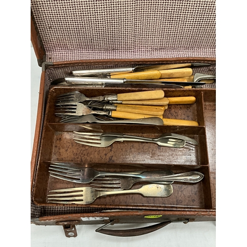 112 - 2 VINTAGE SUITCASES A/F TO INCLUDE PLATED CUTLERY