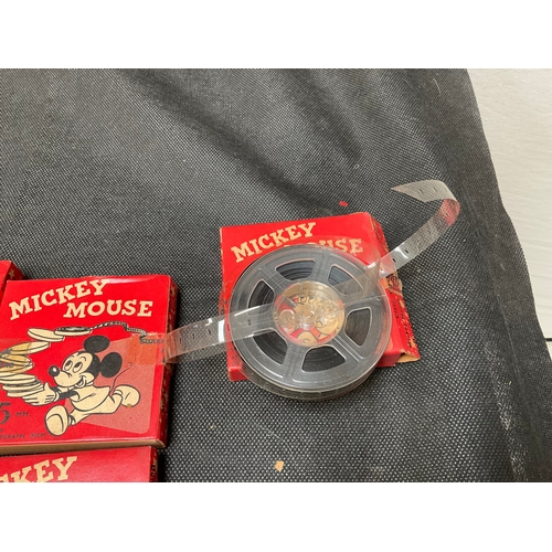 207 - QTY OF VINTAGE MICKEY MOUSE 9.5MM MOVIE REELS ETC - 7 SEALED BOXES AND 2 EMPTY REELS